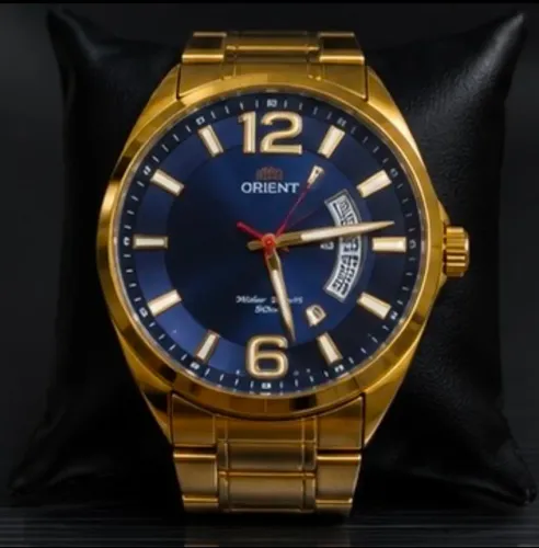 Relógio orient dourado / fundo azul 