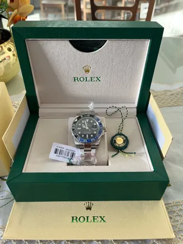 Vendo Relógio GMT master II batmam automático base ETA novo na cx original completa