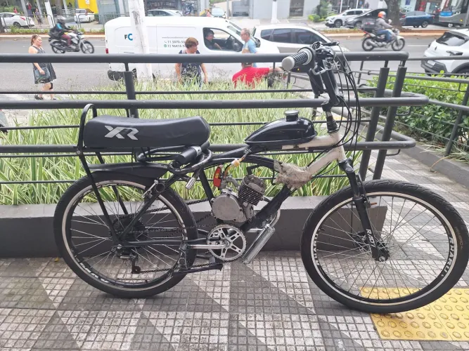 Vendi bicicleta motorizada em perfeito estado nov com dois motor valias peçasz *