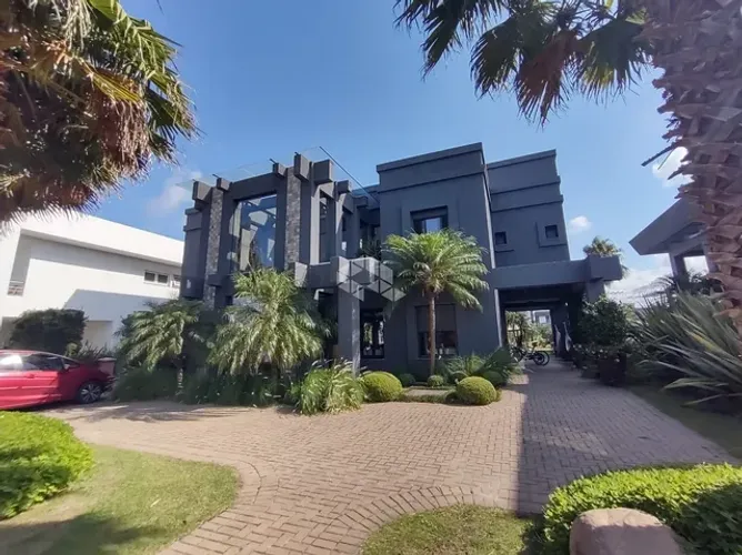 Sobrado à venda, com 5 quartos/dormitórios, 4 vagas/box, no condomínio Villagio, Xangri-Lá