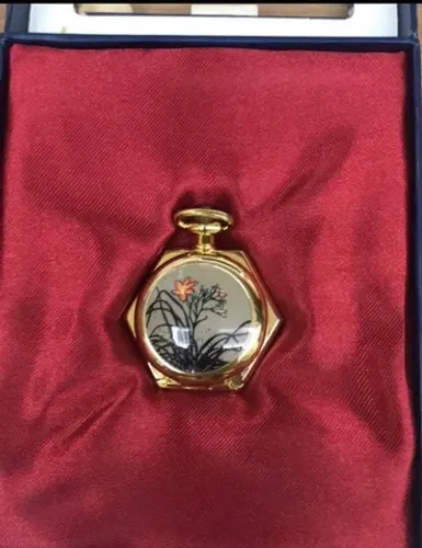 Relogio de bolso dourado 