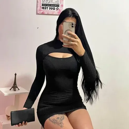 Vestido manga longa preto.Tam médio .no joelho.