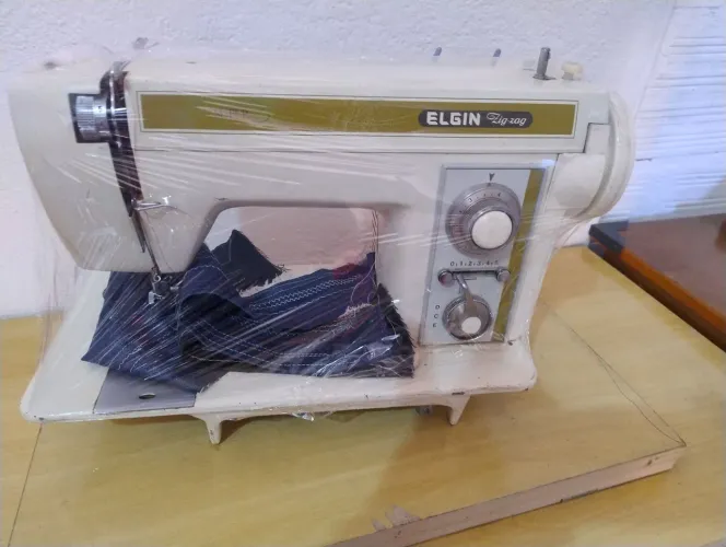 Zig Zag Elgin usada portatil