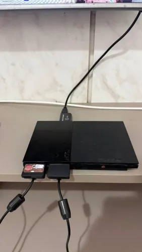 Playstation 2 com dois controles, dois memory cards e pendrive 32gb com jogos
