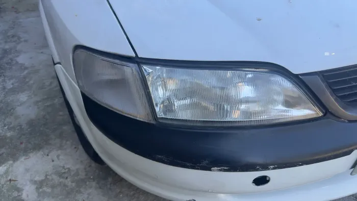 Farol vectra 99