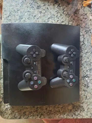 Vendo ps3 desbloqueado novo com 2 controles