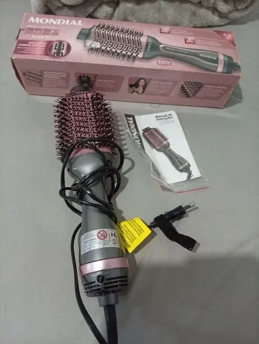 Vende-se uma escova secadora mondila usada duas vezes .