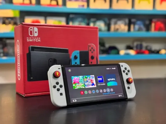 NINTENDO SWITCH OLED 64GB - SEMINOVO (DESBLOQUEADO)