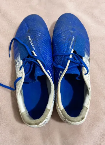 Chuteira Nike Original acompanha chave para troca