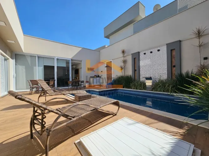 Casa de luxo em condomínio à venda em Americana-SP, bairro Jardim dos Ipês Amarelos: 3 qua