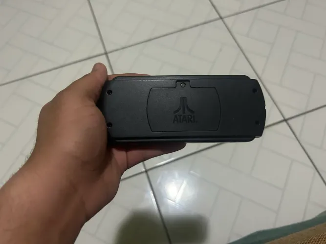 Atari portátil troco por ps2 funcionando 