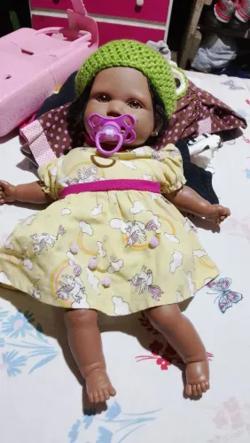 Lote de brinquedos e boneca