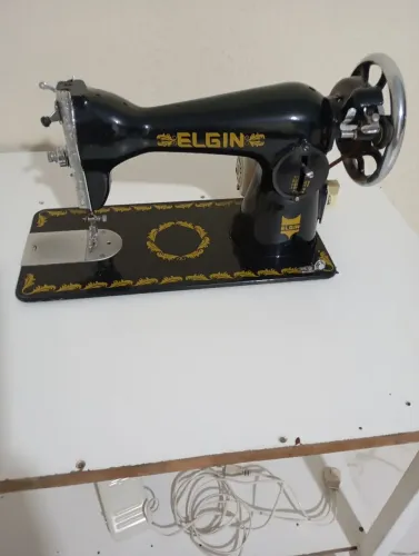 máquina de costura Elgin