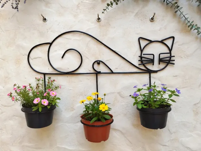 Suporte para plantas em forma de gatinho
