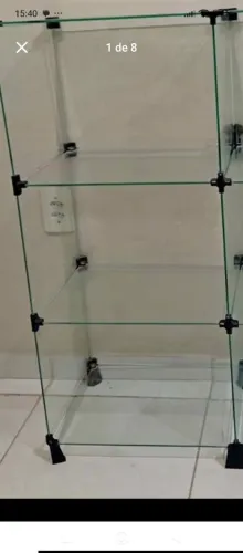 VENDO UM BALCÃO DE VIDRO COM 5 PRATELEIRA