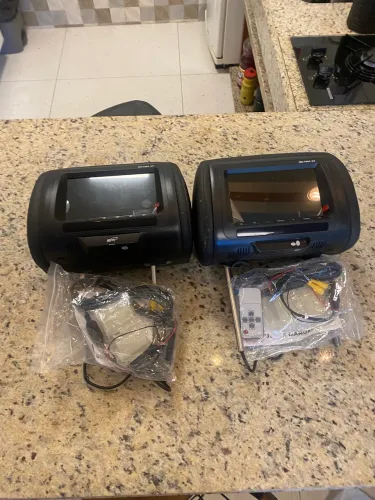 Par de encosto de cabeça com tela 7?