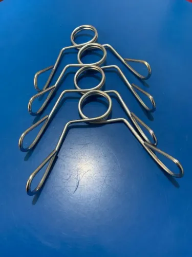 4 presilhas de ferro para prender pesos em barras de 3cm de academia