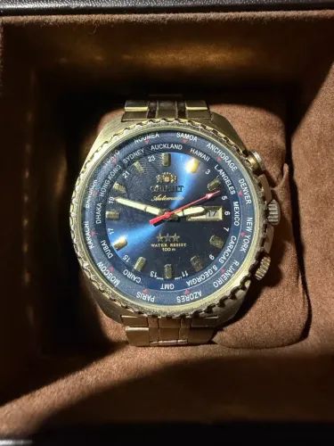 Relógio automático orient world timer