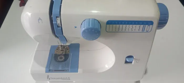 Máquina de costura SteamMAX 