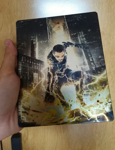 StellBook Deus Ex Making Divided Day One Edition Xbox One (Faço olx pay)