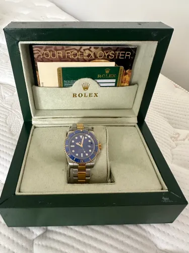 Rolex submariner azul com dourado na caixa