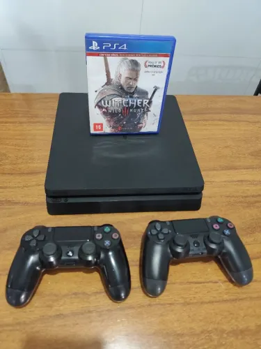 Playstation 4 slim 2 tera, 2 controles, 1 jogo , funcionando perfeitamente