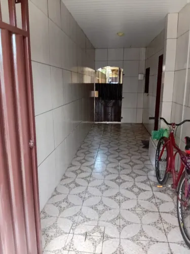 Aluguel de casa em ambiente seguro e familiar.