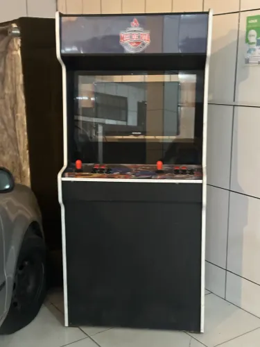 Fliperama Arcade com ficha 