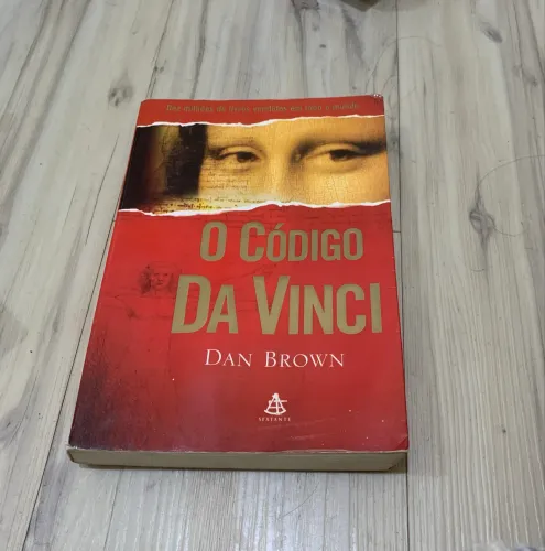 Livro seminovo O Código Da Vinci, de Dan Brown 