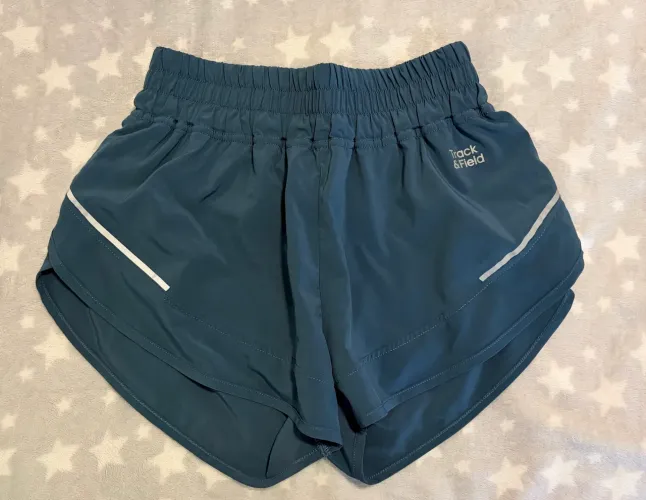 Short Track&Field feminino refletivo
