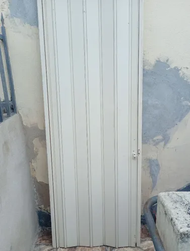 Porta de PVC sanfonada completa