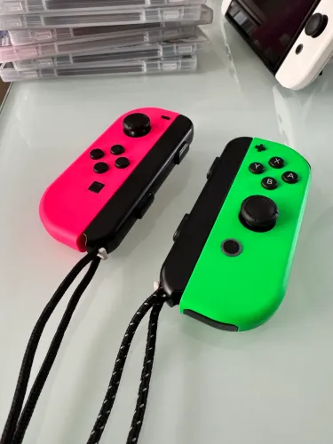 Par de Joy-Cons Nintendo Switch (Rosa Neon e Verde Neon) - Originais
