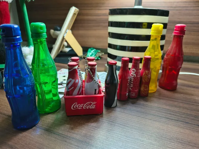 Coleção 12 garrafinhas e engradado Coca Cola antigas