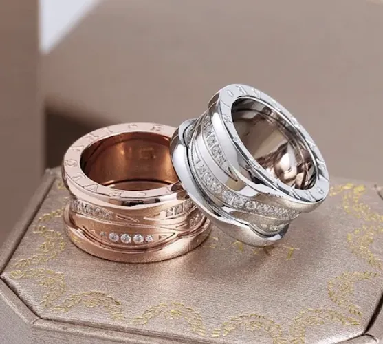 Alianças bvlgari o par com duplo banho em ouro 18 k