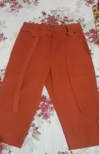 Calça de tecido linho laranja feminina