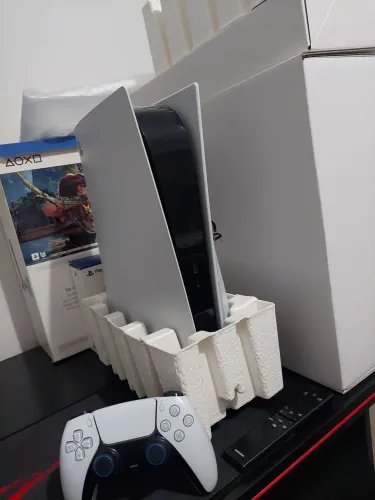 PS5 com leitor de disco controle e jogo