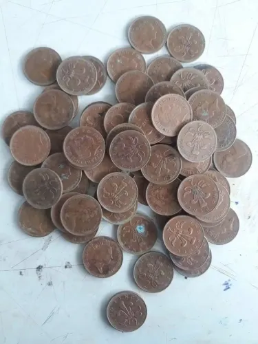 Moedas na conversão da libra para Peso, em Dinar.
