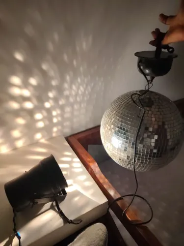 Globo de luz giratório com refletor