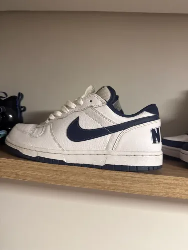 Tenis big logo e bermuda nike woven