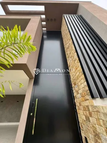 Casa em condomínio à venda, 4 quartos, 4 suítes, 2 vagas, Laranjeiras - Uberlândia/MG