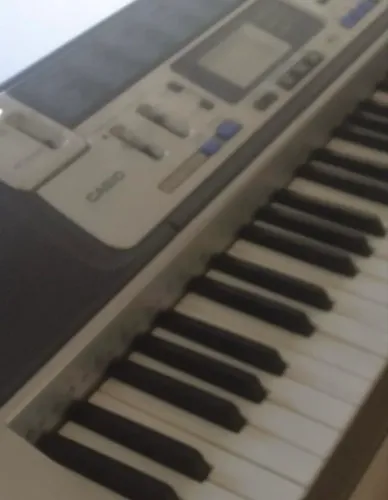 teclado musical casio key lighting Ik-100