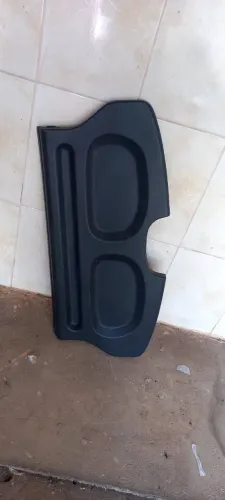 Tampão porta mala Celta 