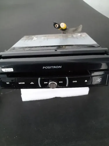 DVD automotivo retrátil Pósitron