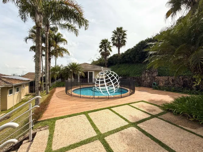 Casa com 5 dormitórios à venda, 511 m² por R$ 4.900.000,00 - Condomínio Serra da Estrela -