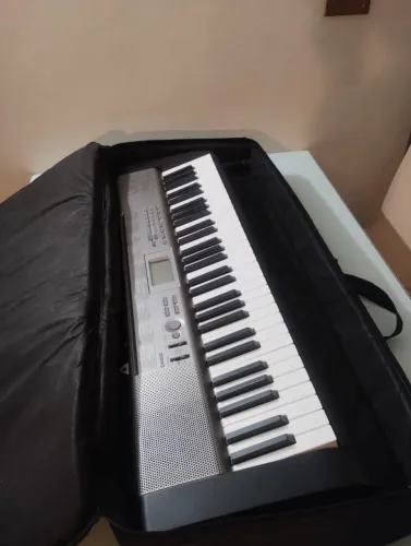 Teclado CASIO LK 120 com bolsa e pedestal completo NF e manuais