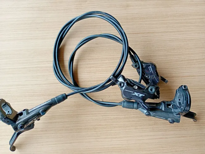Par de freios Shimano XT 4 pistões