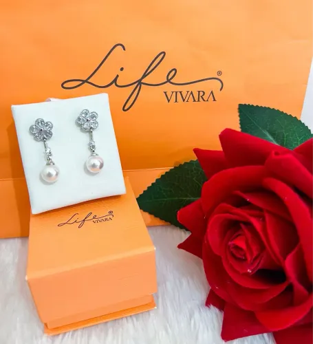 Brinco vivara pérola flor 