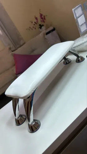 Apoio de mão e aspirador de pó