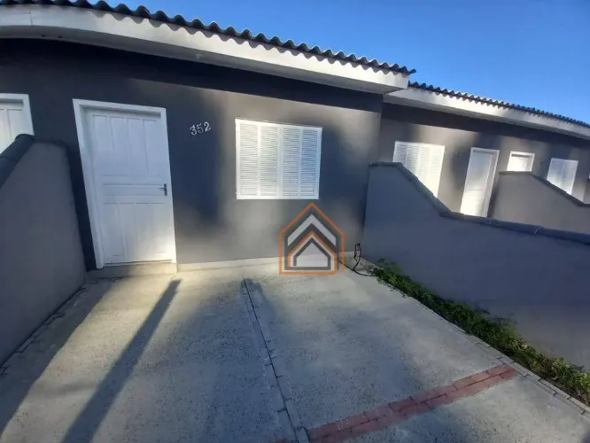 Casa com 2 dormitórios para alugar, 60 m² por R$ 1.150/mês - Piratini - Alvorada/RS