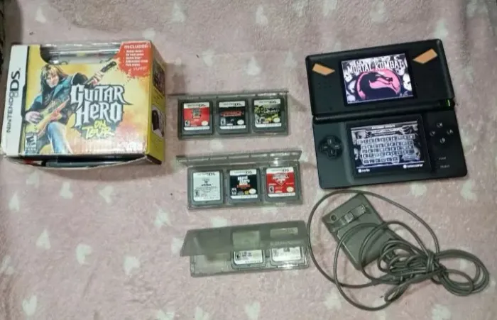 Nintendo Ds azul com diversos jogos 